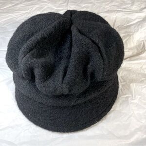 Creativa black wool and polyester hat.